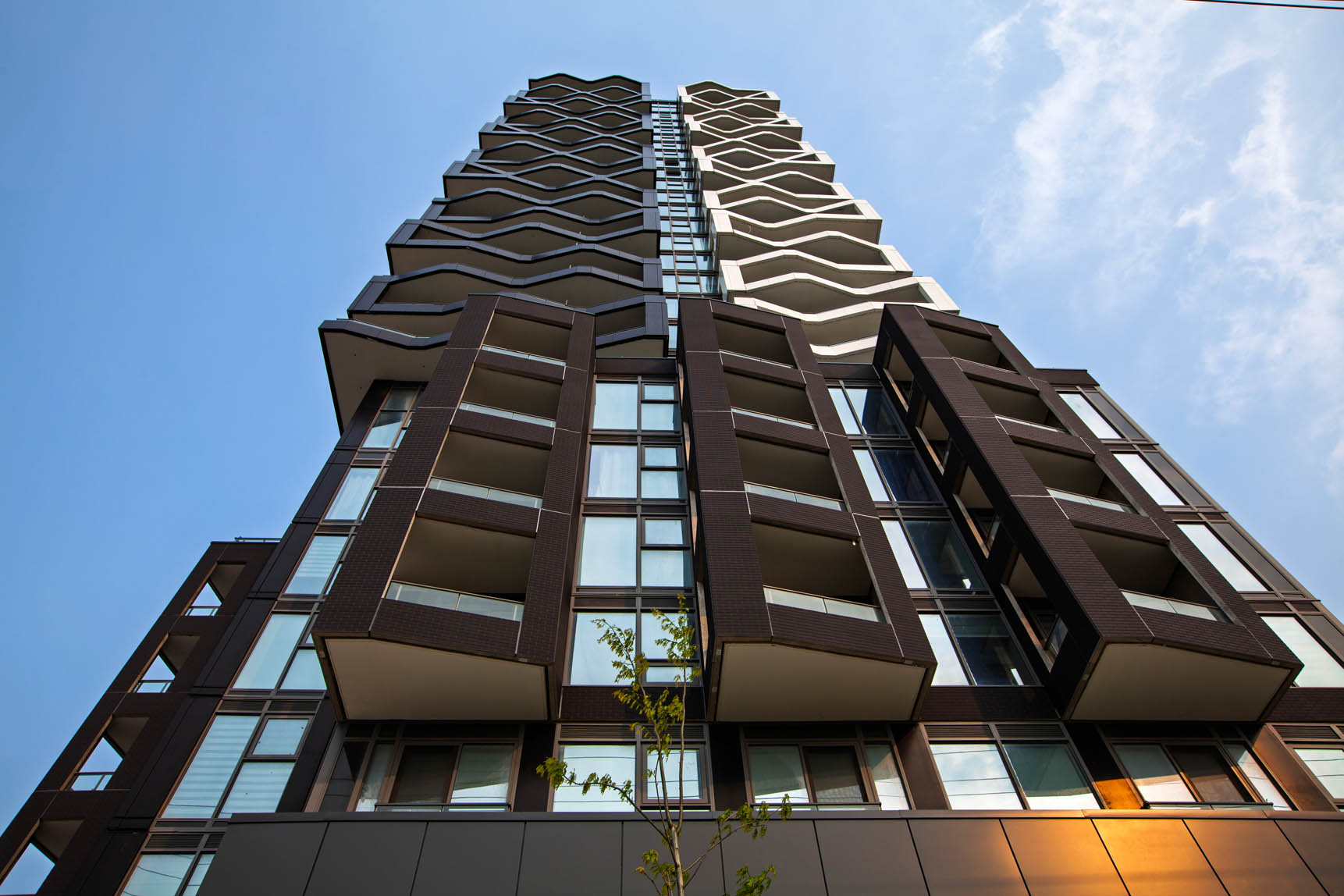 The built DUO condominium tower at 245 Steeles Avenue West, Brampton, seen from below